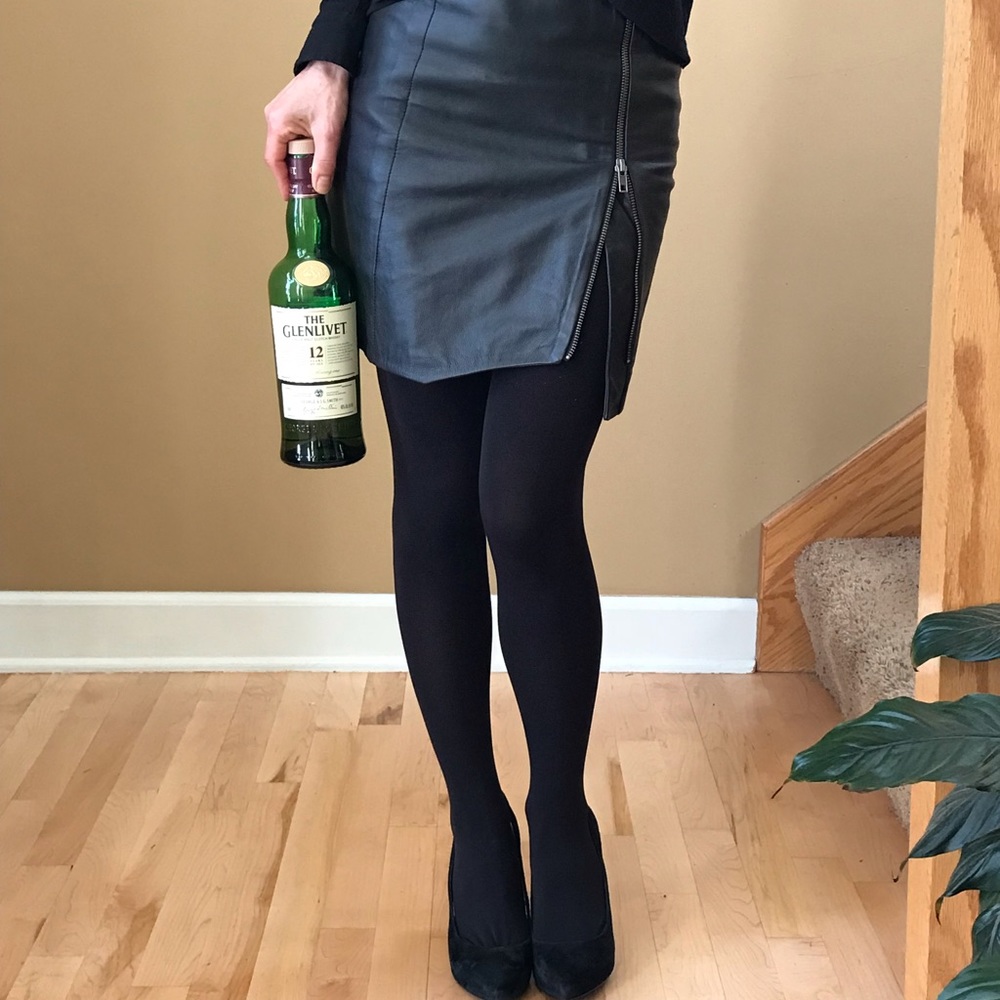 Black leather zip up mini skirt